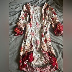 throw over poncho like- long red and white design